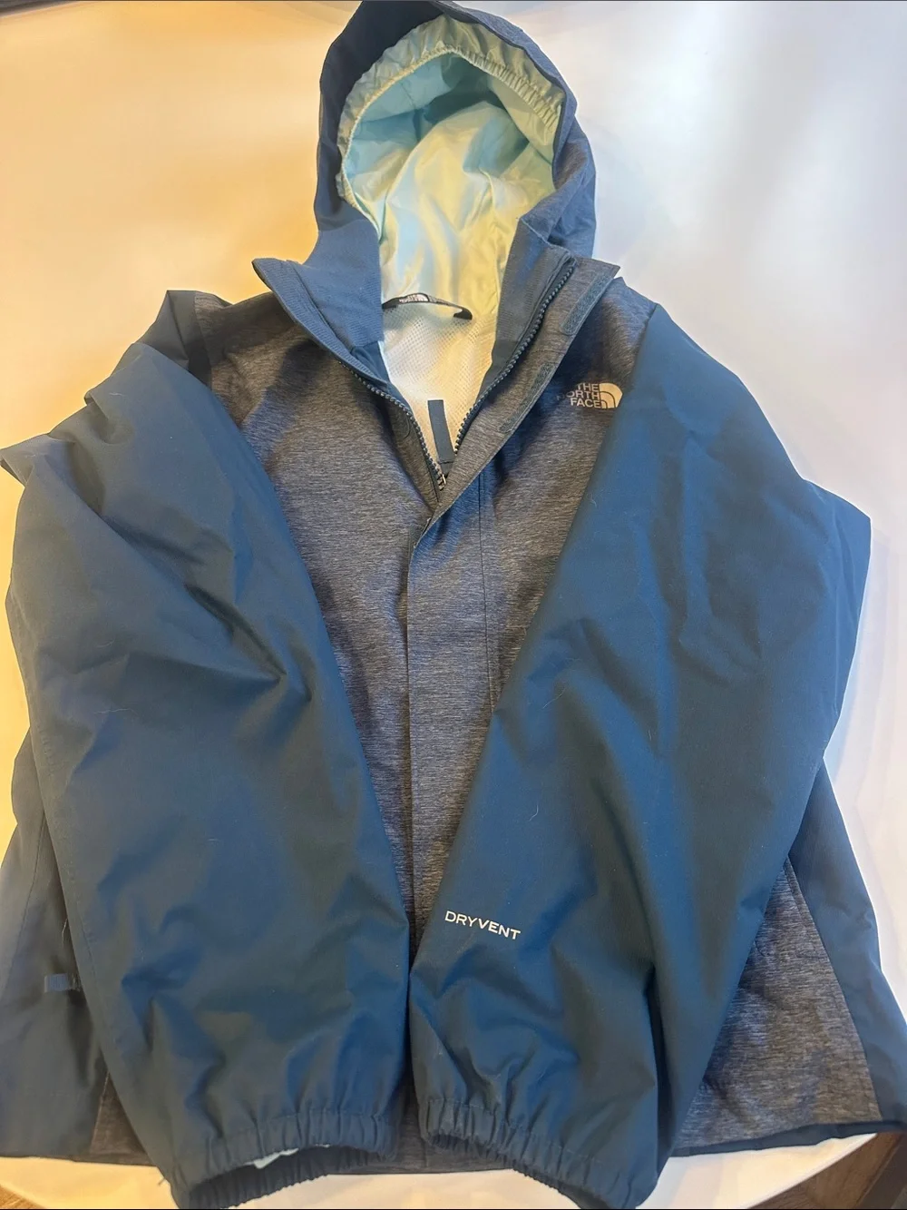 The North Face blue windbreaker jacket size 7/8 for boys and girls